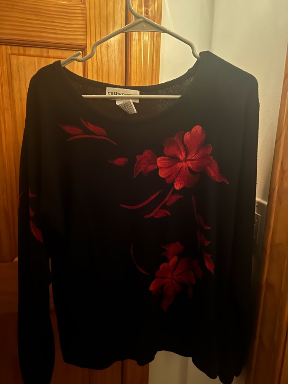 Cathy Daniels Black Sweater with Red Floral Accent